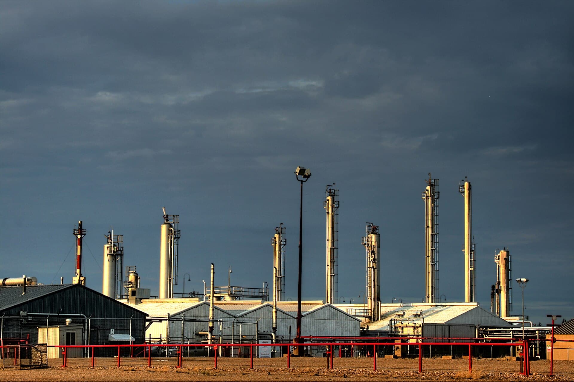 Petrochemical processing plant at dusk